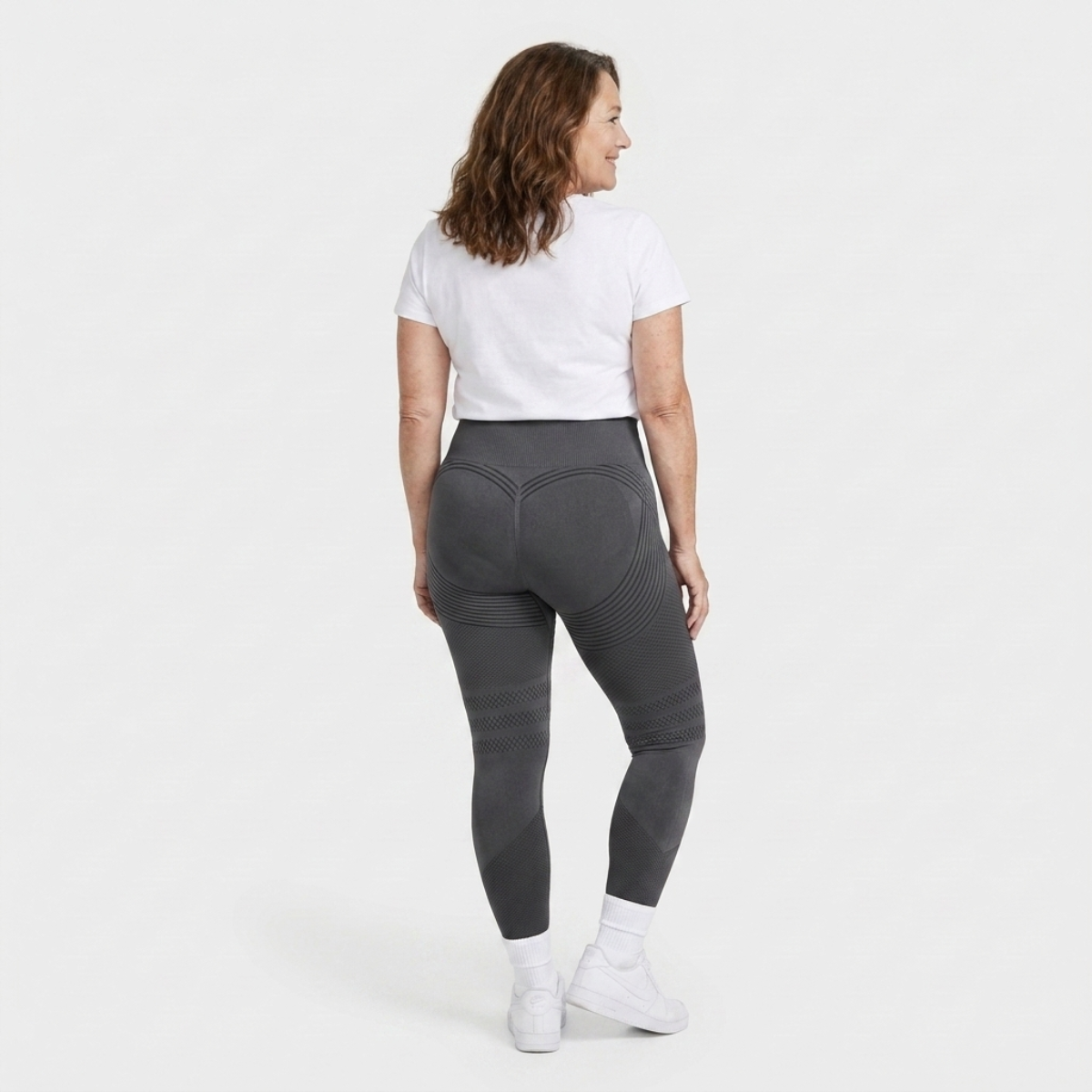 Legging Serena de cintura alta con tejido 3D en color gris, vista trasera