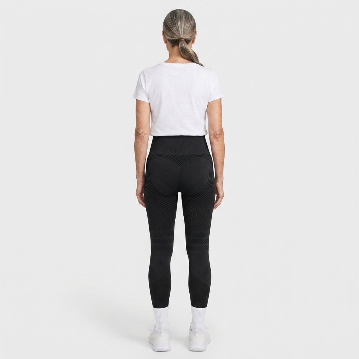 Legging Serena de cintura alta con tejido 3D en color negro, vista trasera